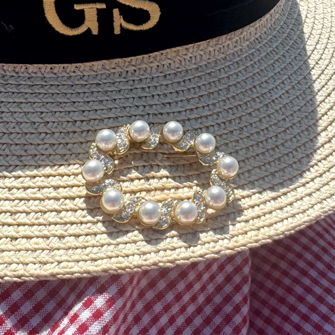 Gouden broche met pareltjes